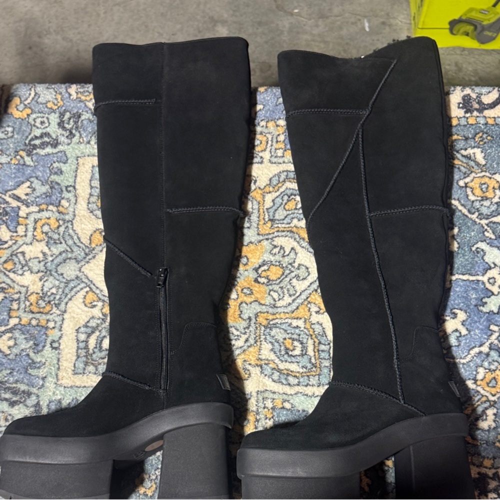 NWT UGG New Heights Platform Xtra for Women
New Over The Knee Black Boots size 8